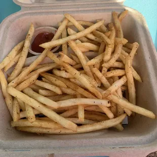 french fries in a styrofoam container