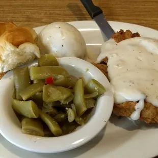 The potatoes and roll was the only thing I enjoyed on this plate.