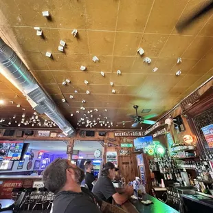Literally there are dollars stuck to the ceiling