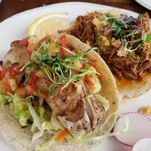 Grilled fish and carnitas tacos.