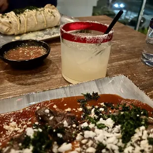 Enjoyed my margarita with my enchilada. Hubby's burrito in the background.