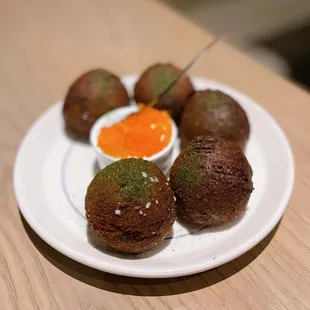 a plate of appetizers on a table
