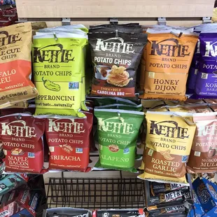 a grocery cart full of chips