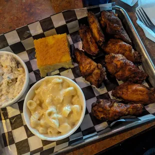 Potato salad, Mac and cheese, cornbread, smoked wings.