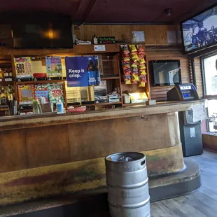 a keg in front of the bar