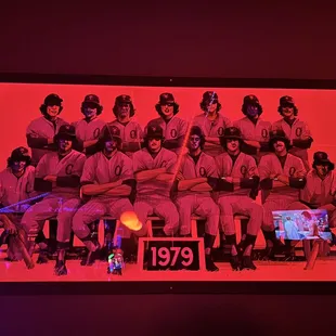 a group of baseball players sitting on a bench