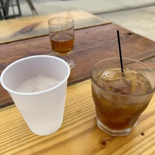 A flight of gin bourbon and amaretto