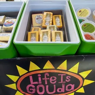 a display of cheeses and crackers