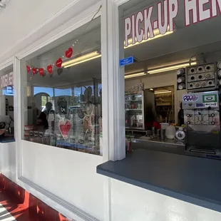 Inside. No seating but I say a covered picnic area outside