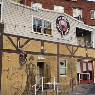 Exterior with upstairs patio dining