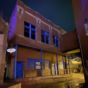 Darkened building. I was fascinated by this bridge between the buildings.