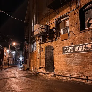 Alley way with Cafe Roka  sign