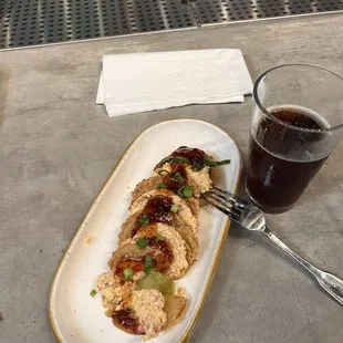 Green fried tomatoes with a dark lager.