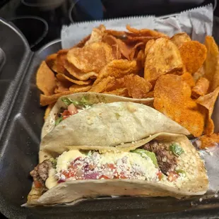 Tacos Peligro and house made chips.