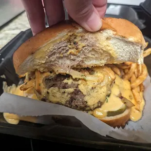 This may be the American Dream burger. It has a lot of caramelized onions, and some pickles. It's salty.