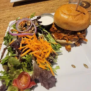 Bbq pulled pork sandwich and side salad