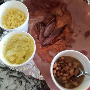 Sausage, mac n cheese, potato salad, pinto beans