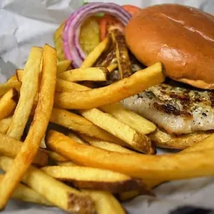 a chicken burger and french fries