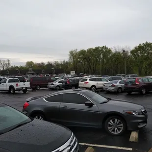 Because it's rainy no one is using the grass parking and filling up the bar parking lot