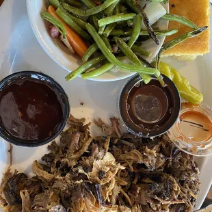 Delicious green beans, pulled pork, brisket, and wonderful cornbread (more like cake).