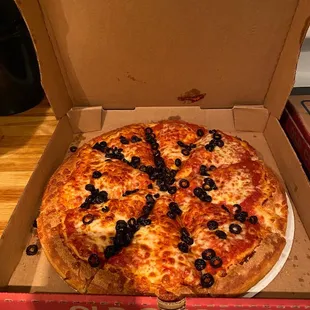 a pizza in a pizza box