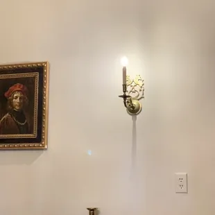 a wall sconce on the wall