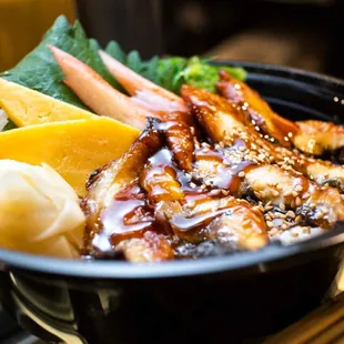 a bowl of asian food