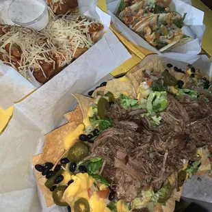 Nachos, Buffalo wings, and the spicy beef tacos.