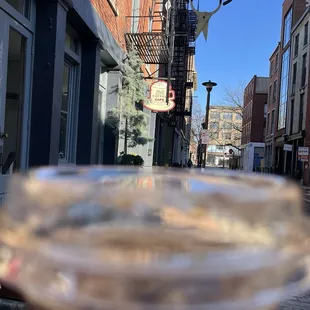 a hand holding a cup of coffee