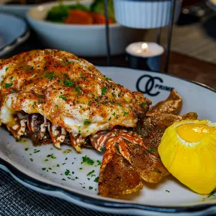 a plate of lobster and chips