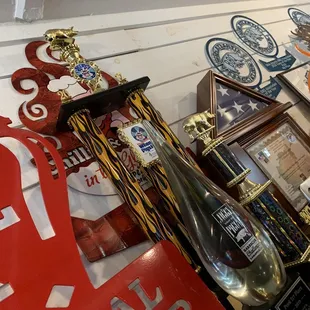 a wall of trophies and memorabilia