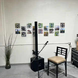 a room with a chair and a guitar