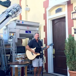 #JimWalters playing some tunes in the shade of the Elevator/De-Stemming Machines at #OldCountyCellars in San Carlos 9-18-16