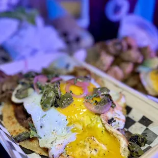 El Coyote Viejo taco and fried okra with black truffle oil and home made dill aioli sauce.