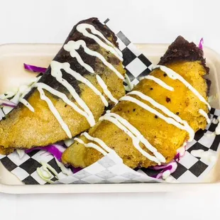 Our brisket and birria empanadas with oaxaca cheese!