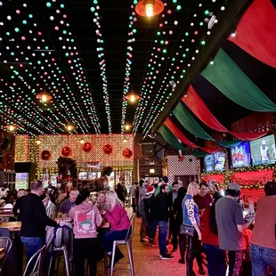 a crowd of people sitting at tables
