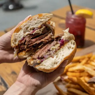 We have tons of delicious sandwiches and burgers to choose from, including our tri-tip sandwich pictured here. Each one is served a side.