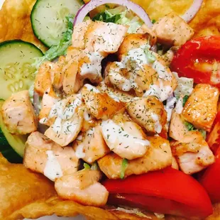 a chicken salad in a tortilla bowl