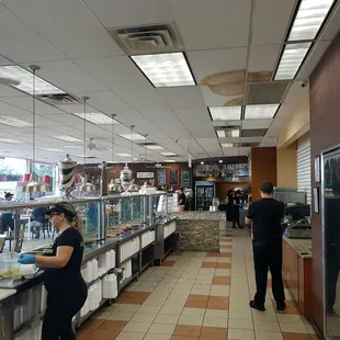 a man and a woman ordering food