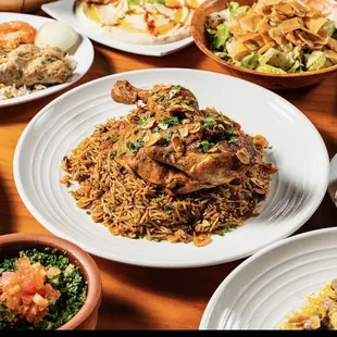 Taboulah , Kabsa rice with chicken, fatoush , chicken kabab