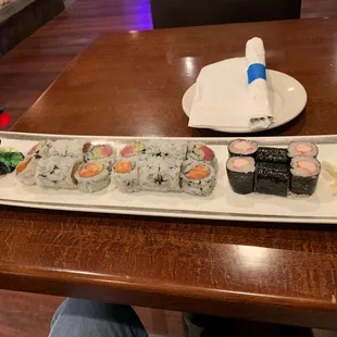 a long rectangular platter of sushi