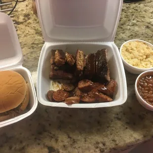 Ribs, hot links, chopped beef sandwich, baked beans and potato salad. Deliciousness!!