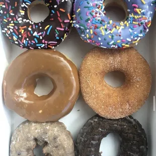 a variety of donuts in a box