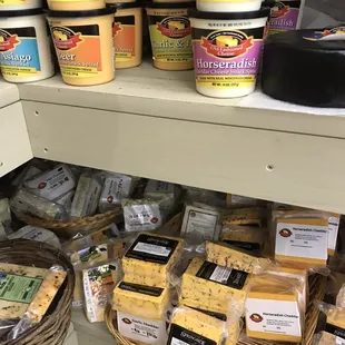 a variety of cheeses and crackers