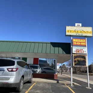 a car parked in front of a restaurant