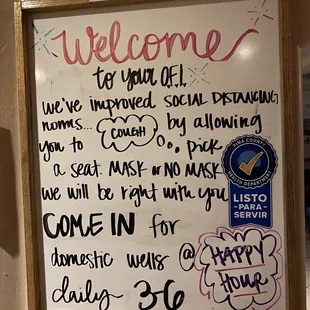a welcome sign on the wall