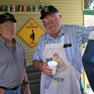 My father the late Al Menshew and a friend working the libations booth at the 2003 OFC Family Day.