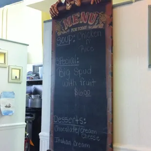 a menu on a chalkboard