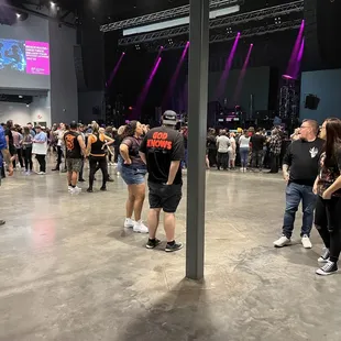 a crowd of people walking around