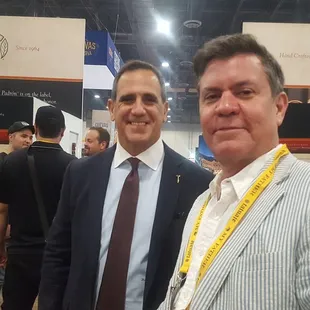 Len, the owner, with George Padron.